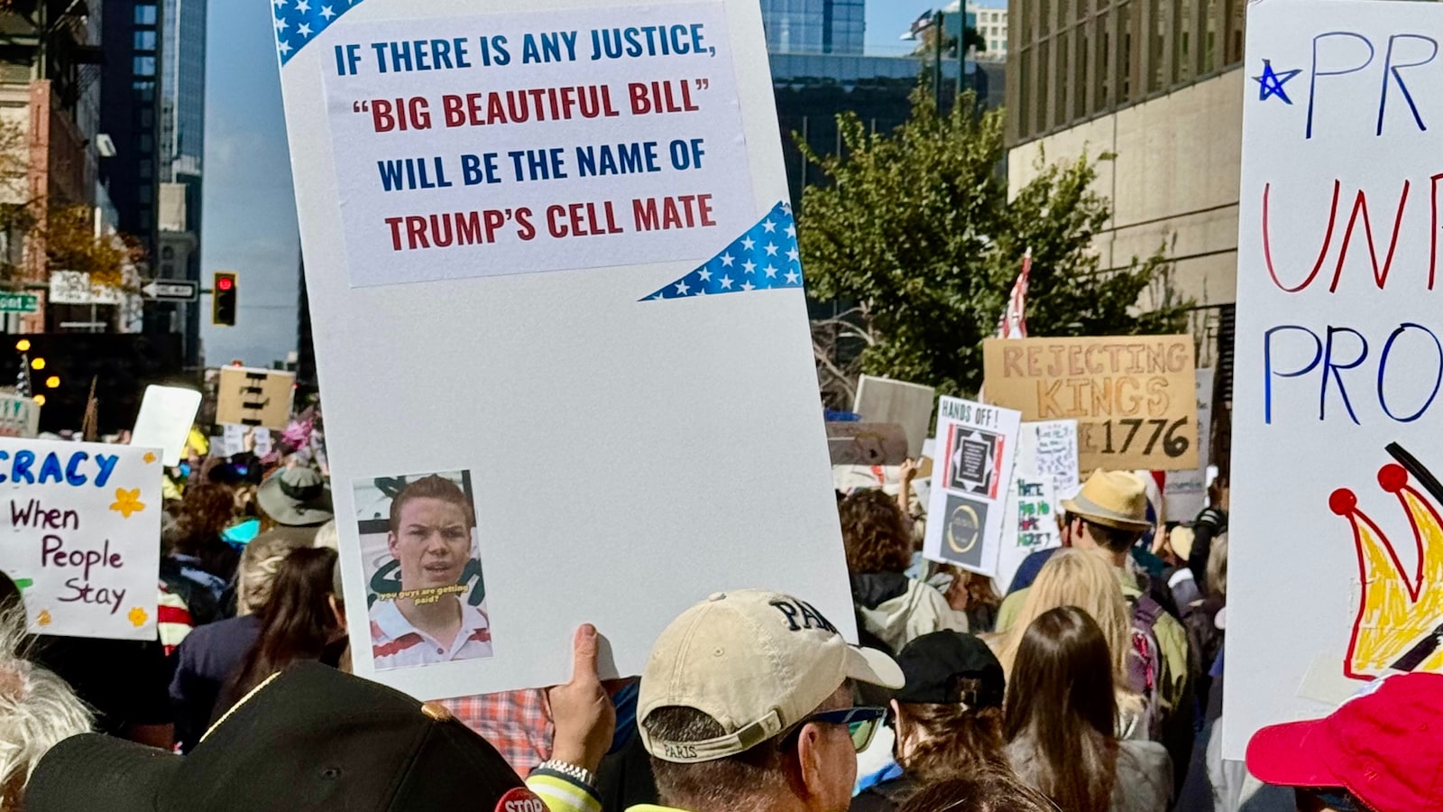 City protest signs showing clothing and public expression in fashion activism